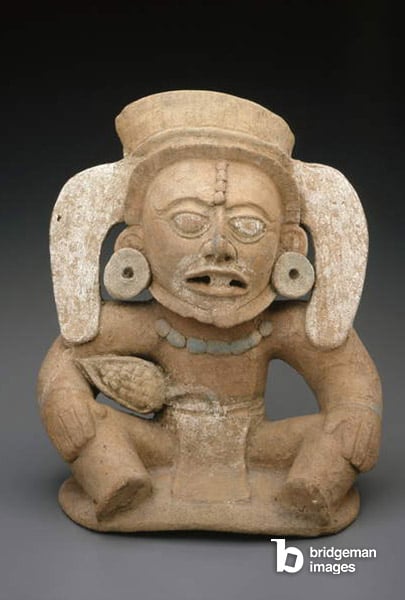 Figure from a vessel top in the form of a cocoa (chocolate) deity, 600-900 AD (slipped & painted earthenware), Mayan  © Indianapolis Museum of Art  Gift of Bonnie and David Ross / Bridgeman Images