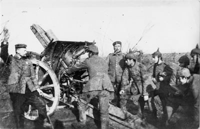 UIG1583848 British Front, Belgium, 1914 Battle of Messines, 1914 (b/w photo); (add.info.: German soldiers with 10.5cm Light Field Howitzer. Messines, Belgium. 1914. .); Windmill/Robert Hunt Library/UIG; out of copyright