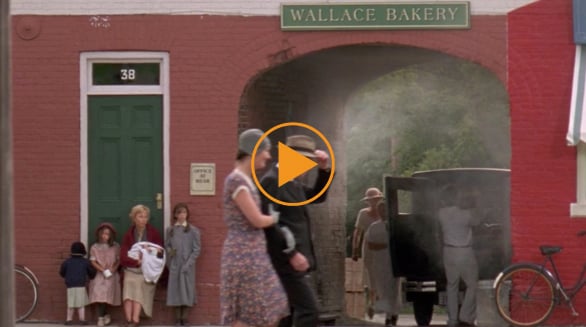  People outside a town bakery, 1930s - reenactment / Sullivan Entertainment