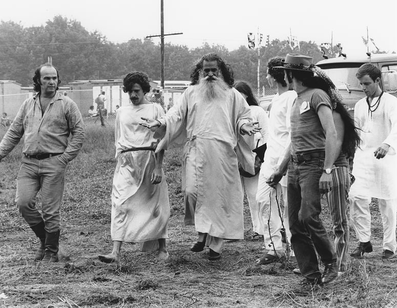 HIPPIE MOVEMENT, 1969 An Indian guru and his followers at the Woodstock festival. / Photo © Richard Busch / Granger / Bridgeman Images 