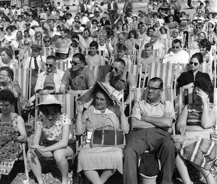 Every seat was taken at Hastings, and plenty had to stand. But they didn't mind that one little bit! August 1960 (b/w photo) / Hastings, East Sussex, UK / © Mirrorpix