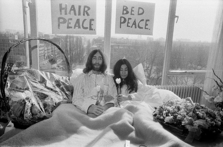 MPX421972 John Lennon and his wife Yoko Ono are having a week's love-in in their room at the Hilton Hotel, March 1969 (b/w photo); Amsterdam, The Netherlands; (add.info.: John Lennon (1940-80) English rock musician; Yoko Ono (b.1933) Japanese artist and peace activist;); Â© Mirrorpix; PERMISSION REQUIRED FOR NON EDITORIAL USAGE; out of copyright. PLEASE NOTE: Bridgeman Images works with the owner of this image to clear permission. If you wish to reproduce this image, please inform us so we can clear permission for you.