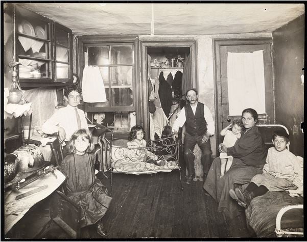 Family in room in tenement house, c.1910 (gelatin silver print), Jessie Tarbox Beals (1871-1942) / Museum of the City of New York, USA