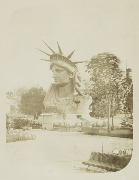 Head of the Statue of Liberty on display in a park in Paris, 1883 (albumen print) , Fernique, Albert (d.1898) / New York Public Library, USA