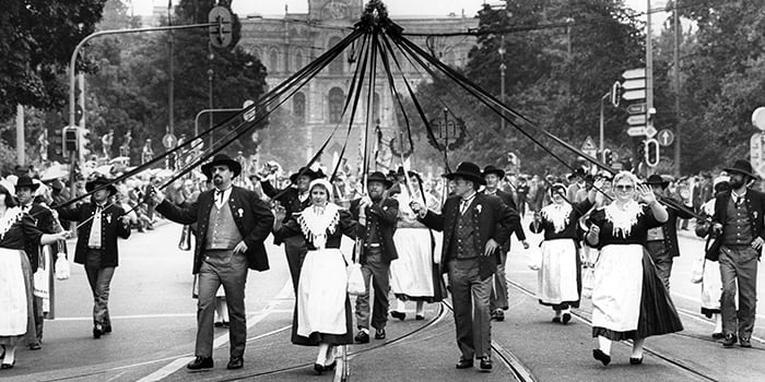 SZP1076319 Participants at the traditional folklore parade during the Oktoberfest in Munich, Germany, 1988 (b/w photo); © SZ Photo / Karl-Heinz Egginger; PERMISSION REQUIRED FOR NON EDITORIAL USAGE; out of copyright PLEASE NOTE: Bridgeman Images works with the owner of this image to clear permission. If you wish to reproduce this image, please inform us so we can clear permission for you.