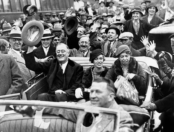 Franklin Delano Roosevelt (1882-1945) in convertible car during electoral campaign for Presidential elections in 1932 / Bridgeman Images