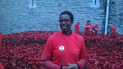 Beatrice Okoro outside the Tower of London installation