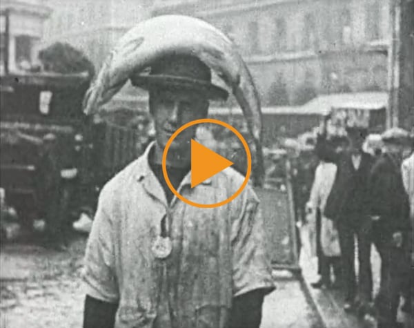  Porters at Billingsgate fish market carry fish on their heads, London 1930s / Brian Trenerry Archive / Bridgeman Footage