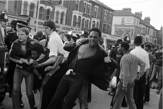 Brixton Riot, 1981 (b/w photo) / Photo © Neil Libbert