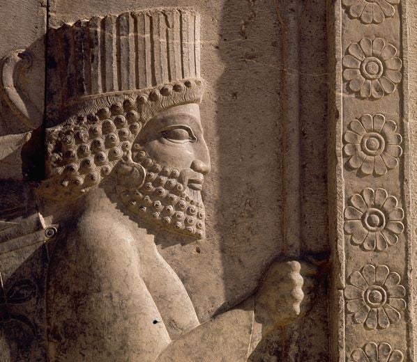 A detail of a relief carving on the staircase leading to the Tripylon at Persepolis, depicting a Persian / Werner Forman Archive