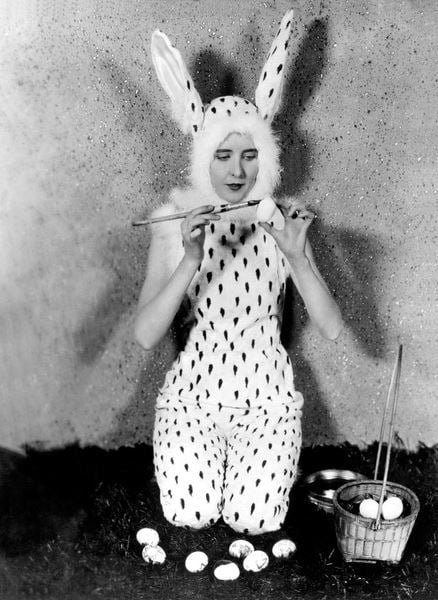 Easter Bunny Painting Eggs (b/w photo) / Underwood Archives/UIG