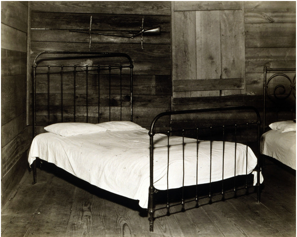 The bedroom of Floyd Burroughs, cotton sharecropper, Hale County, Alabama. Hale County, Alabama. Published in the book, 'Let Us Now Praise Famous Men'. photograph by Walker Evans, 1936 / Photo © Everett Collection