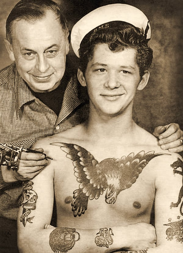 The Tattoo Artist Doc Forbes and his client, Vancouver, Canada,   (Sepia Photo)
