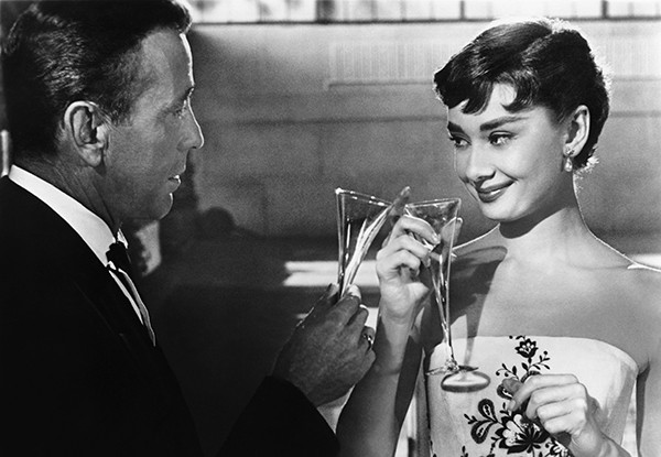 Sabrina, 1954 directed by Billy Wilder. Humphrey Bogart and Audrey Hepburn Photo © DILTZ