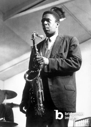 John Coltrane (1926-1967) saxophonist during a concert at Newport festival in 1958 / Bridgeman Images