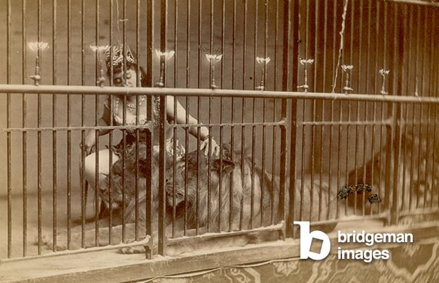 A Young Woman Lion Tamer, Europe, c.1890, Frédéric Boissonnas, (1858-1946)  © Progettali  Bridgeman Images